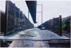 Work completed building storage bins alongside the railway sidings out of 480 old sleepers.